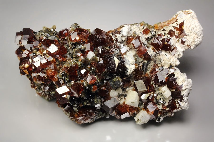 gem GARNET var. SPESSARTINE, VESUVIANITE, ALBITE