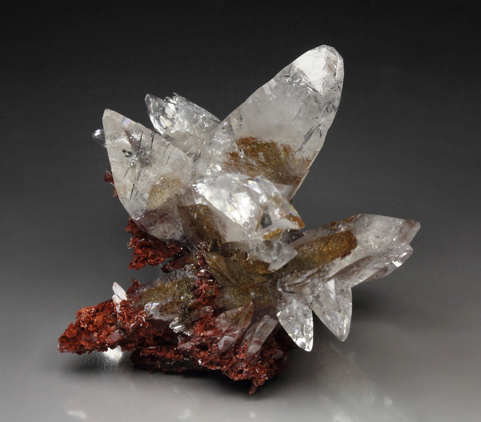 twinned CALCITE with HEMATITE inclusions