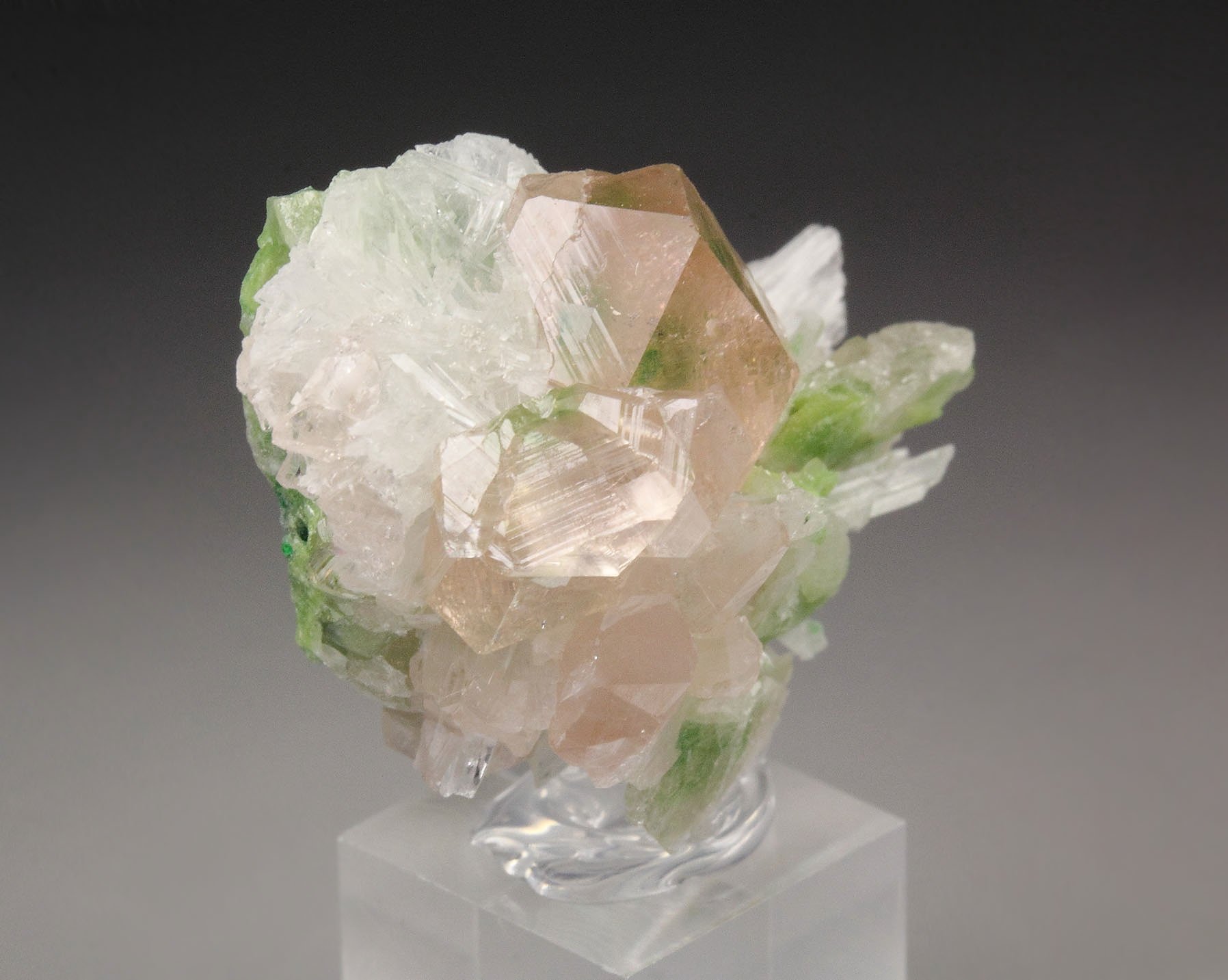 gem PINK GARNET var. GROSSULAR with GREEN CHROMIAN PHANTOMS, PECTOLITE, DIOPSIDE