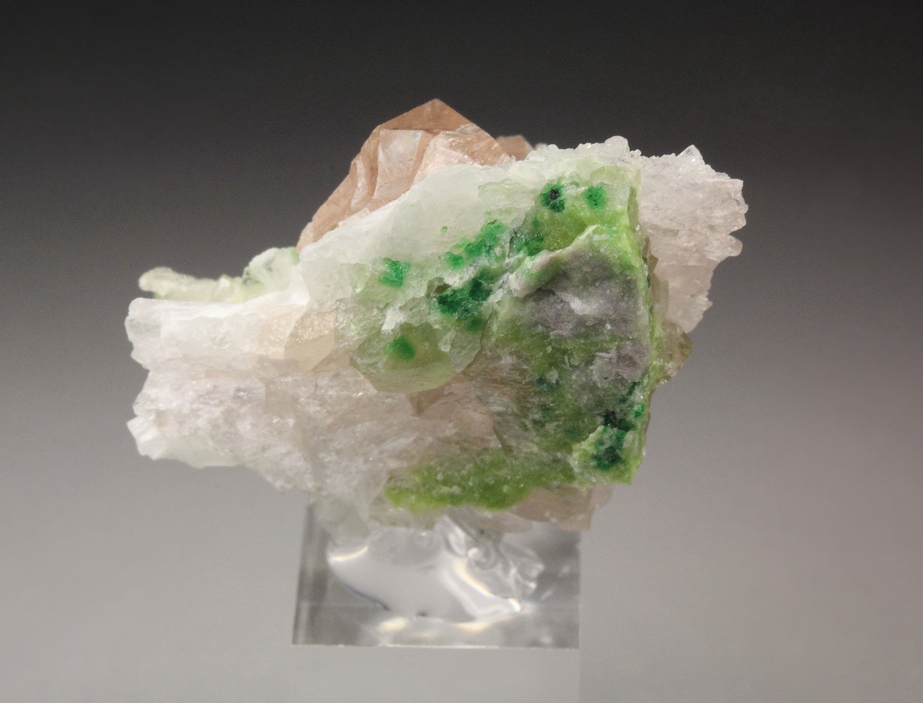 gem PINK GARNET var. GROSSULAR with GREEN CHROMIAN PHANTOMS, PECTOLITE, DIOPSIDE